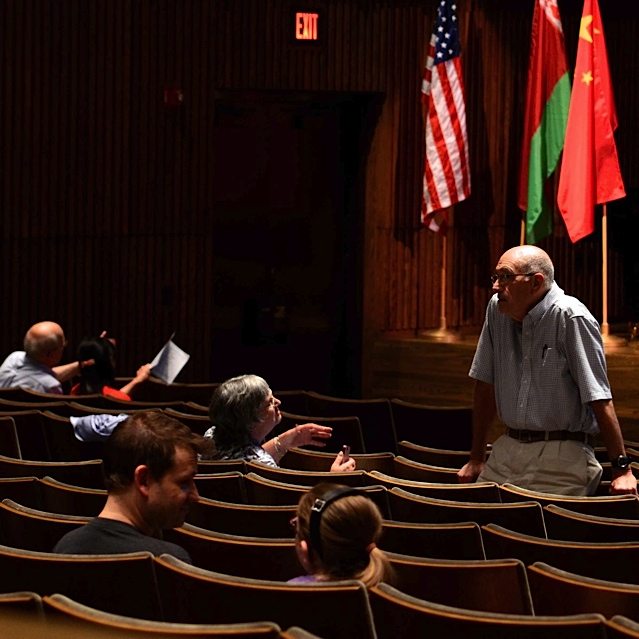 Members of the audience relax during intermission in Gartner Auditorium