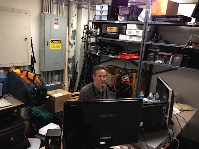 Video Engineer Mark Dumm backstage at the Cleveland Museum of Art’s Gartner Auditorium.